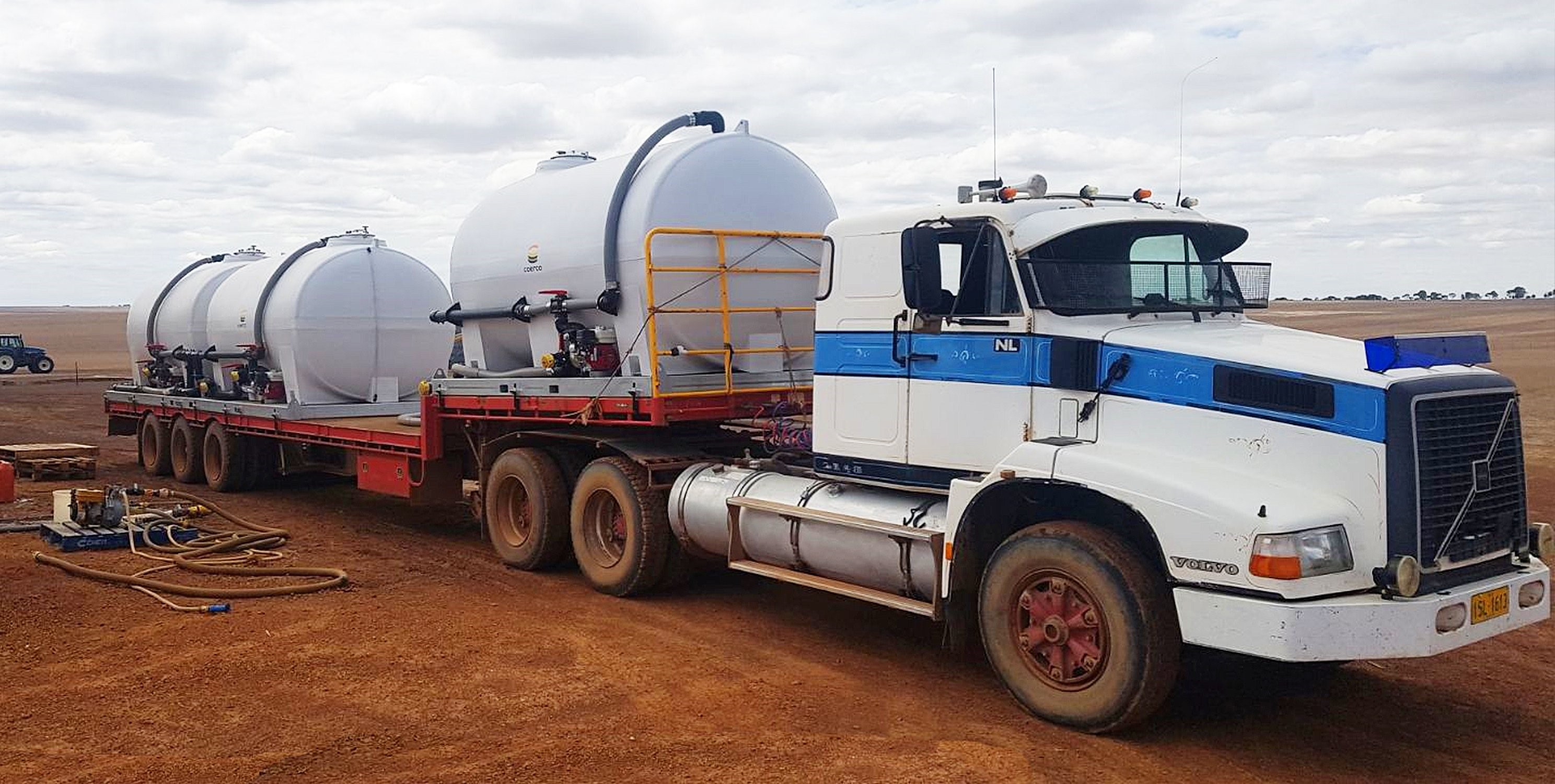 Liquid transport setup on a drop deck semi trailer - set up by Coerco-1