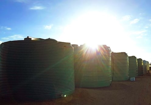 a line of poly tanks